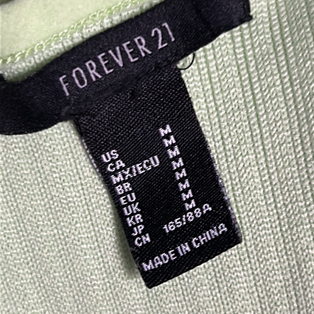 Forever 21 Sleeveless Ribbed Bodycon Mini Dress with caged Deep V-Neckline - Picture 6 of 7